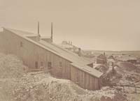 #1302 - Rear View of Tombstone Mill & Mining Companies' 10-Stamp Water Mill, Arizona Territory
